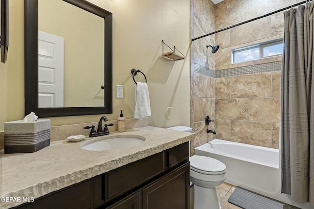 full bathroom with vanity, toilet, and shower / bath combo with shower curtain