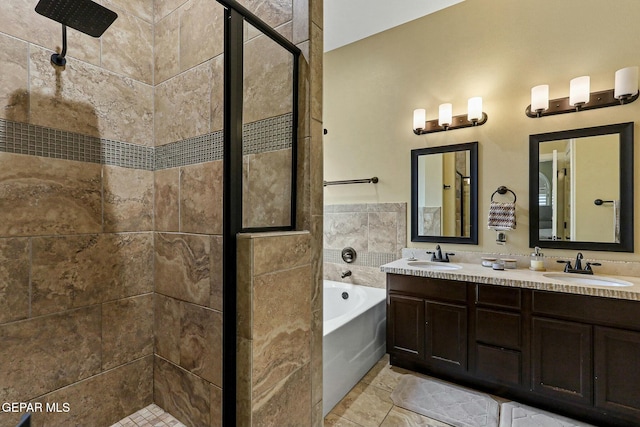 bathroom featuring separate shower and tub, tile patterned flooring, vanity, and tile walls