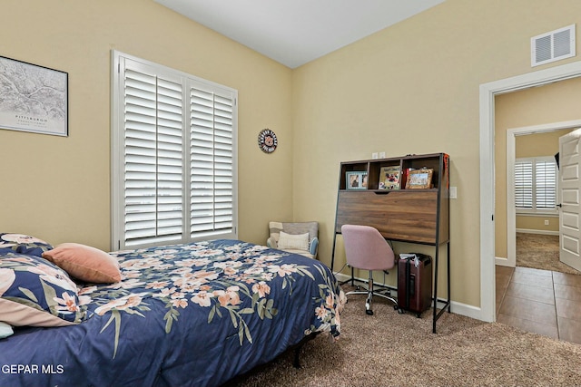 bedroom featuring carpet