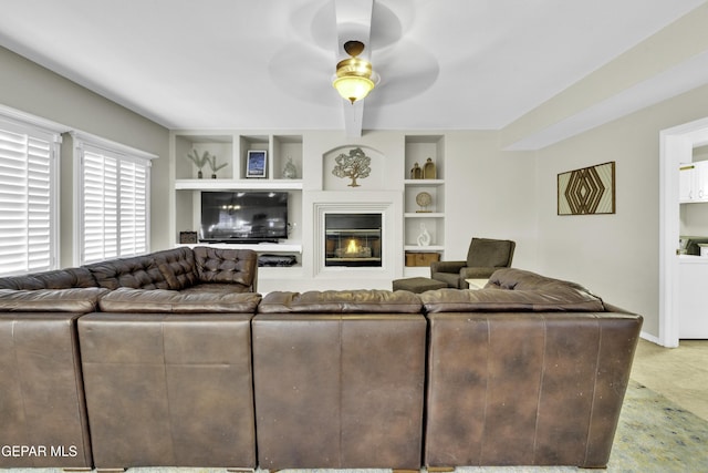 living room featuring ceiling fan