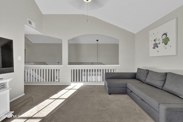 unfurnished living room with carpet floors, ceiling fan, and lofted ceiling