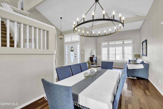 dining room with beam ceiling, dark hardwood / wood-style flooring, and high vaulted ceiling