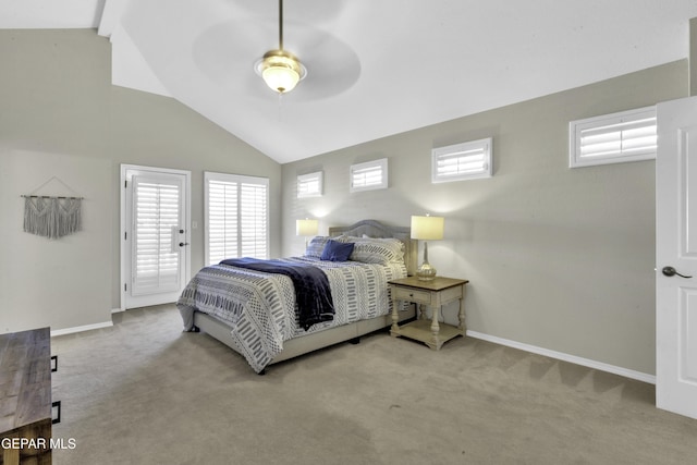 carpeted bedroom featuring lofted ceiling with beams and ceiling fan