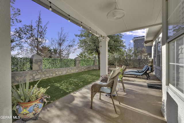 view of patio with ceiling fan