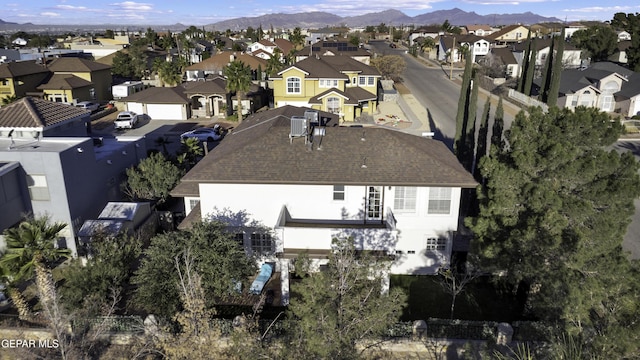 bird's eye view with a mountain view