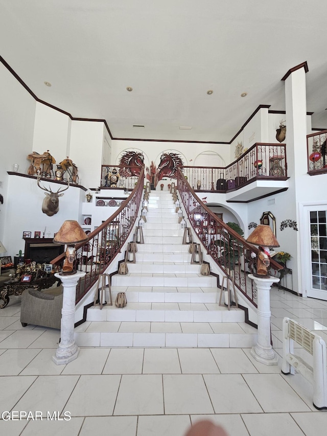 stairs featuring tile patterned flooring