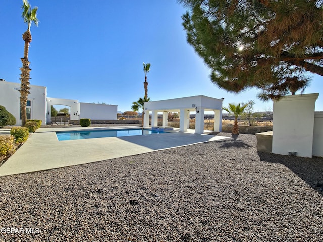 view of pool with a gazebo and a patio