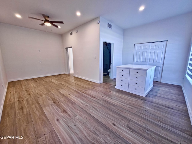 unfurnished bedroom featuring ceiling fan and light hardwood / wood-style floors