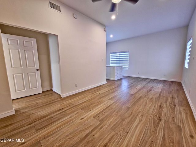 unfurnished living room with light hardwood / wood-style floors and ceiling fan