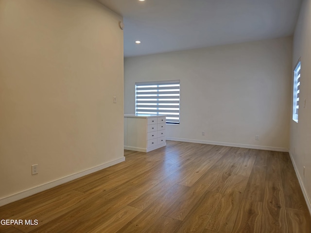 unfurnished room featuring light hardwood / wood-style flooring