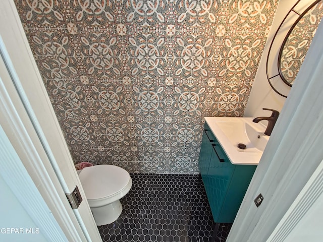 bathroom with vanity and toilet