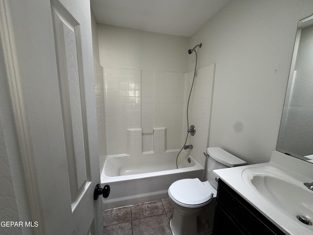 full bathroom with tile patterned flooring,  shower combination, vanity, and toilet