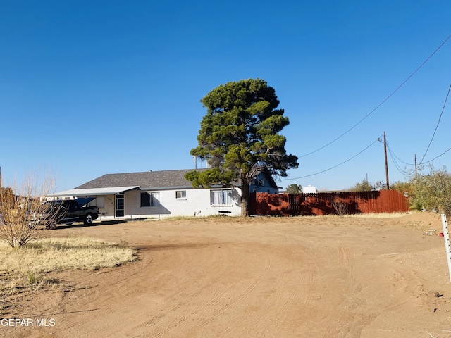 view of yard featuring a carport