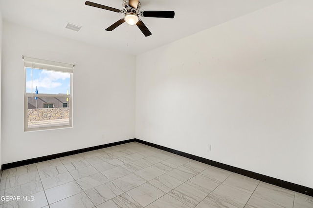 spare room featuring ceiling fan