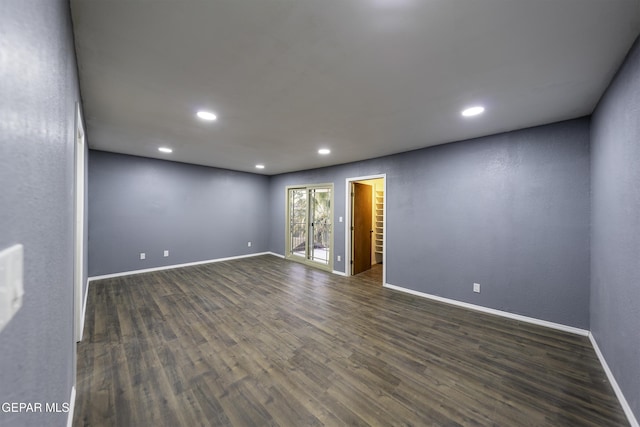 empty room featuring dark hardwood / wood-style floors