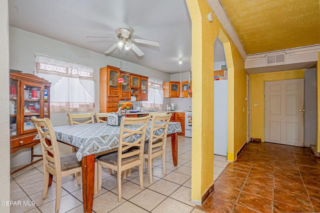 dining area featuring ceiling fan