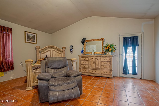 tiled bedroom with vaulted ceiling