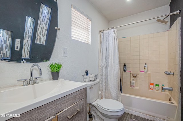 full bathroom featuring vanity, toilet, and shower / bath combo with shower curtain