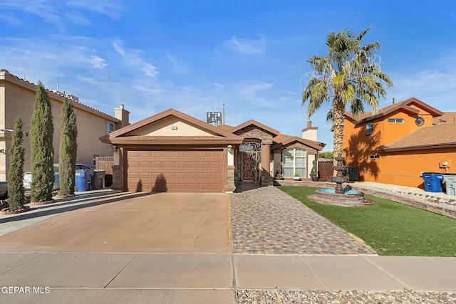 view of front of home with a garage