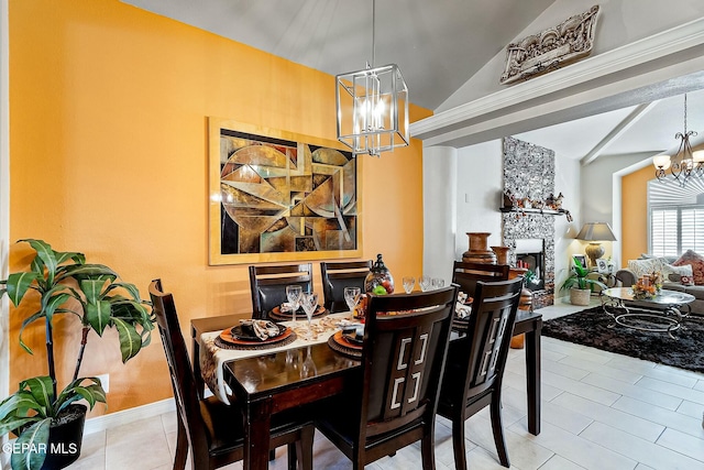 tiled dining room featuring a notable chandelier, a stone fireplace, and vaulted ceiling