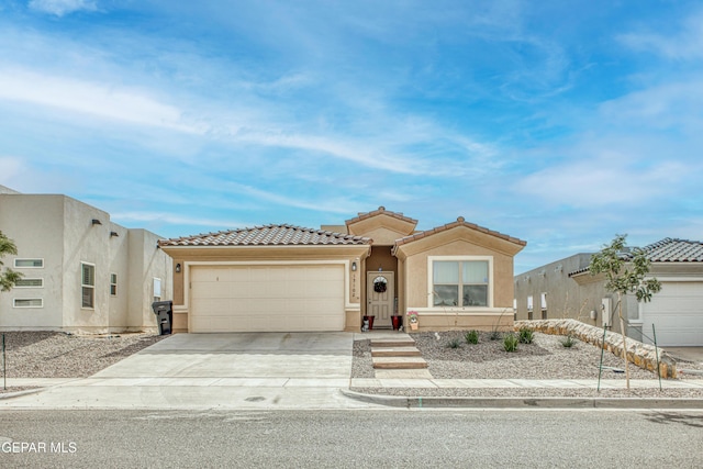 view of front of home with a garage