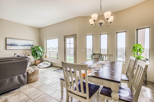 dining room featuring a notable chandelier