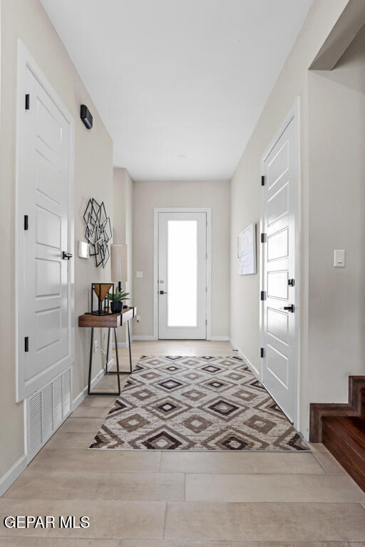 entrance foyer with light hardwood / wood-style floors