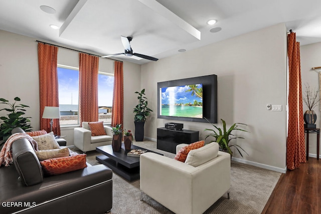 living room featuring ceiling fan and wood-type flooring