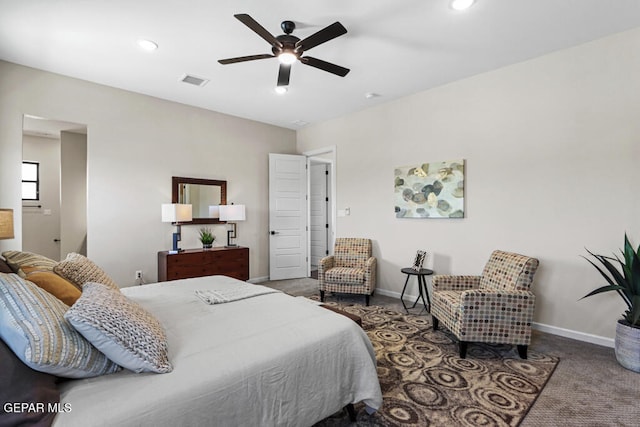 carpeted bedroom with ceiling fan