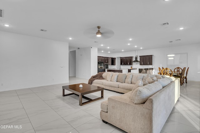 living room with ceiling fan