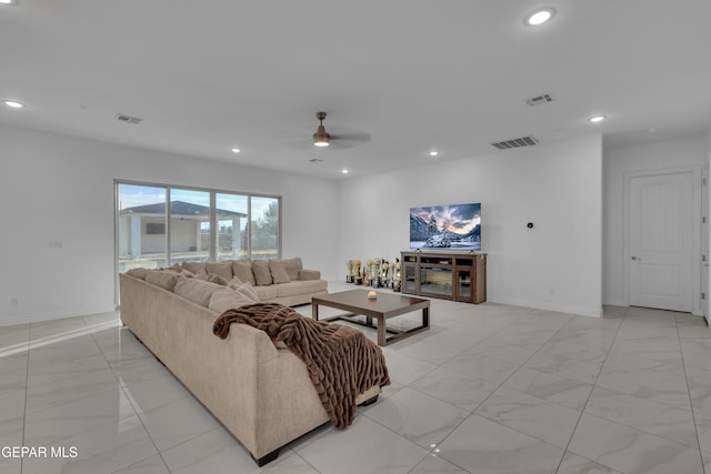 living room with ceiling fan