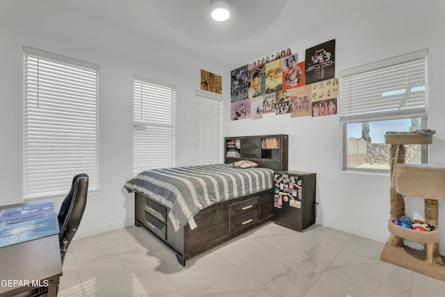 bedroom featuring ceiling fan