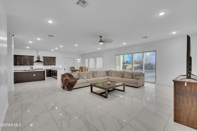 living room featuring ceiling fan