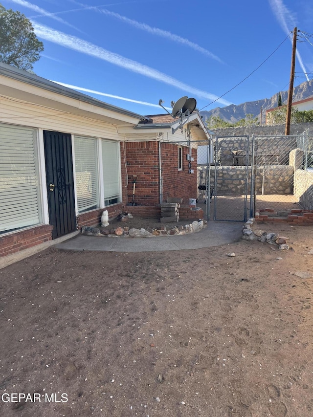 exterior space featuring a mountain view