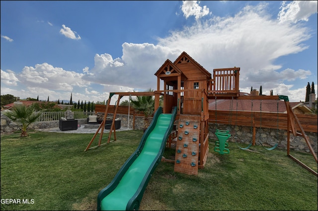 view of play area with a yard