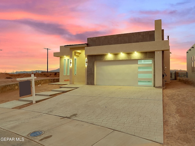 view of front of property featuring a garage