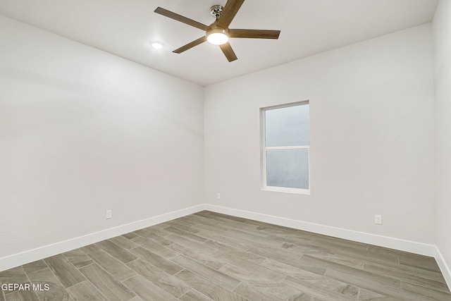 unfurnished room with ceiling fan and light hardwood / wood-style flooring