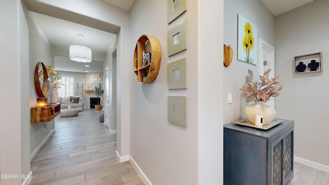 corridor featuring light hardwood / wood-style flooring