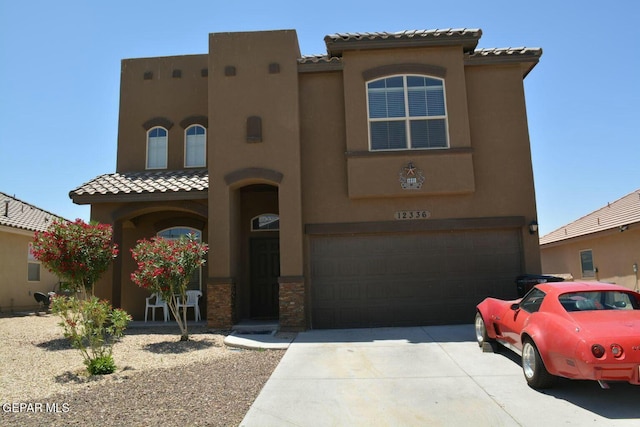 view of front of home with a garage