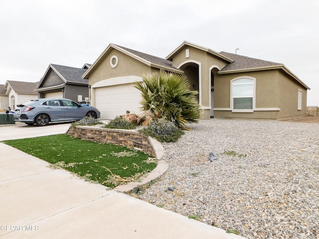 single story home featuring a garage