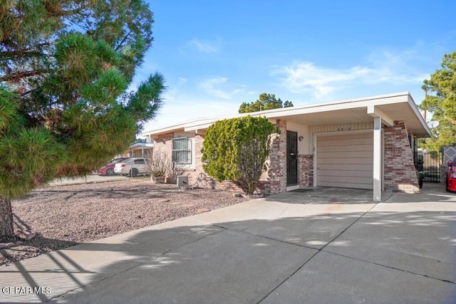 single story home with a garage