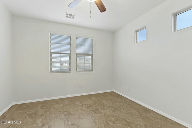 empty room featuring ceiling fan