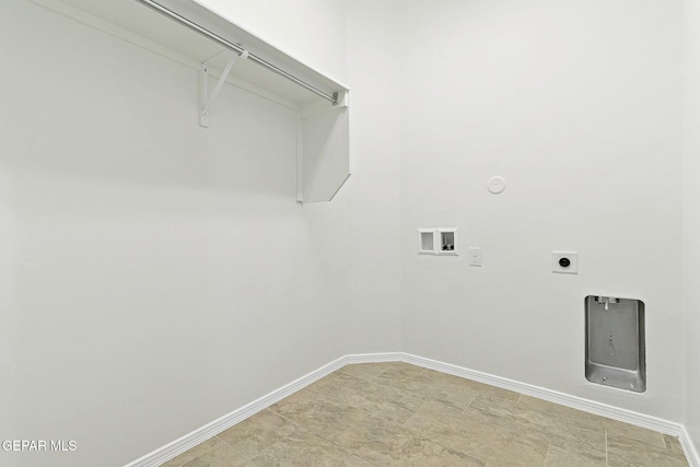 clothes washing area featuring hookup for an electric dryer, hookup for a gas dryer, and hookup for a washing machine