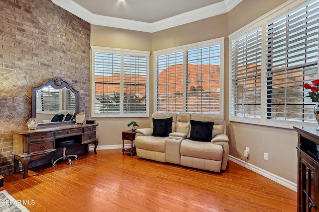 office area featuring crown molding and light hardwood / wood-style floors