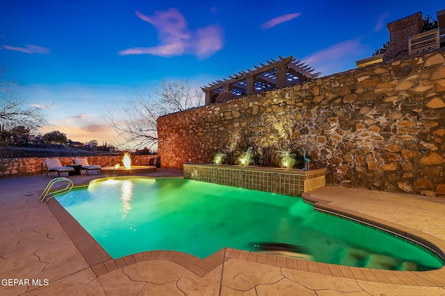 pool at dusk with a patio, a fire pit, and a pergola