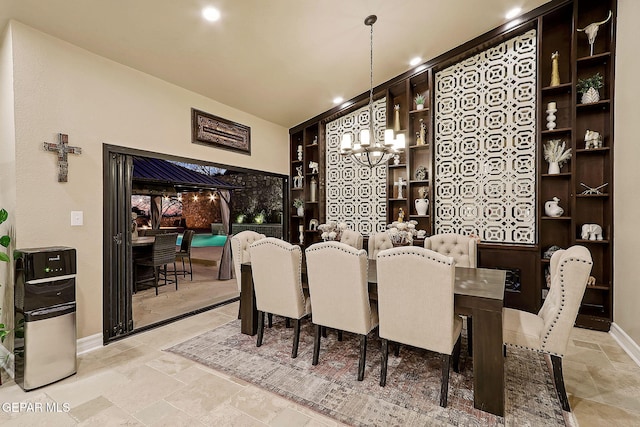 dining area featuring a chandelier