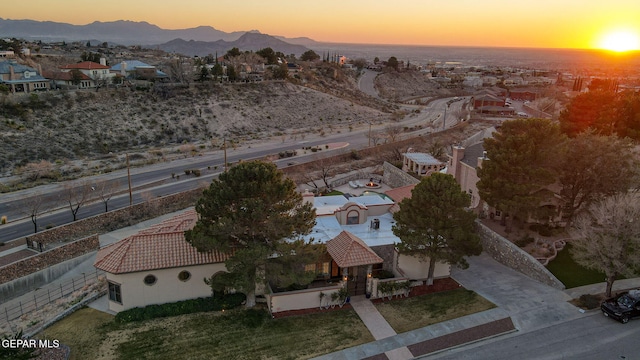 aerial view at dusk with a mountain view