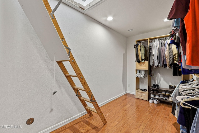 spacious closet with wood-type flooring