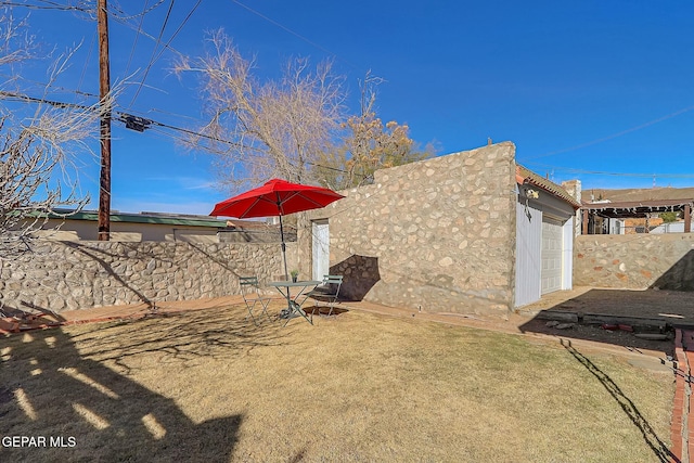 view of yard featuring a garage