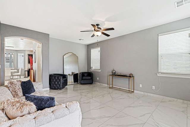 living room with ceiling fan